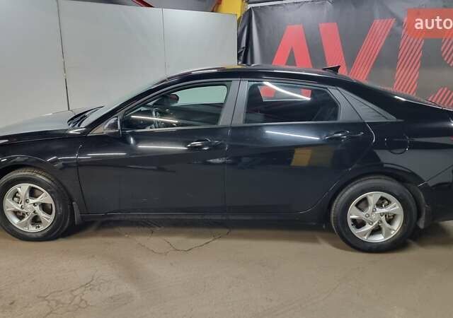 Черный Хендай Элантра, объемом двигателя 1.59 л и пробегом 55 тыс. км за 17900 $, фото 2 на Automoto.ua