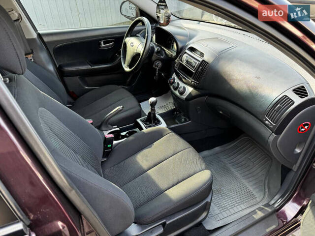 Хендай Элантра 2007 в Днепре (Днепропетровске) на Automoto.ua Фиолетовый Хендай Элантра, объемом двигателя 1.6 л и пробегом 70 тыс. км за 6300 $, фото 12 на Automoto.ua