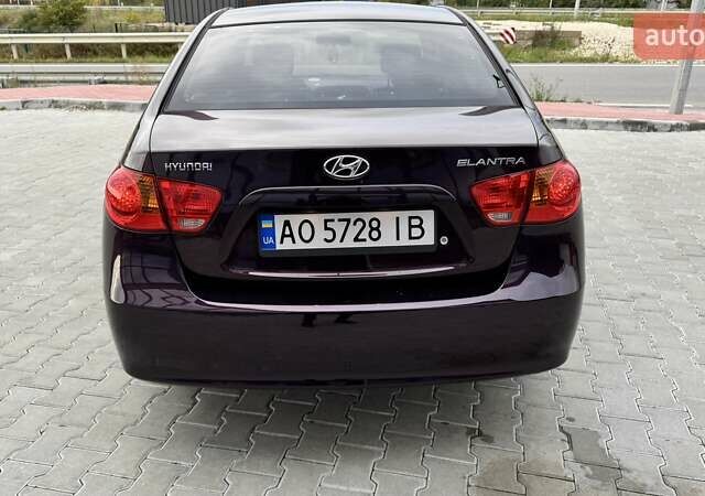 Хендай Элантра 2007 в Тернополе на Automoto.ua Фиолетовый Хендай Элантра, объемом двигателя 1.59 л и пробегом 198 тыс. км за 7299 $, фото 4 на Automoto.ua