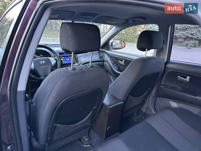 Фіолетовий Хендай Елантра, об'ємом двигуна 1.6 л та пробігом 198 тис. км за 6850 $, фото 40 на Automoto.ua