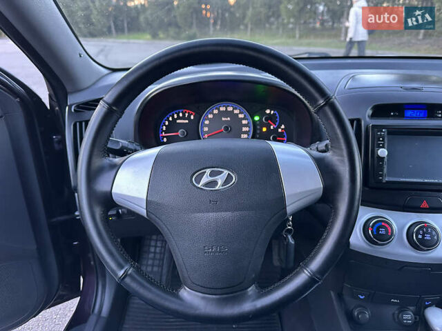 Фиолетовый Хендай Элантра, объемом двигателя 1.6 л и пробегом 198 тыс. км за 6750 $, фото 28 на Automoto.ua