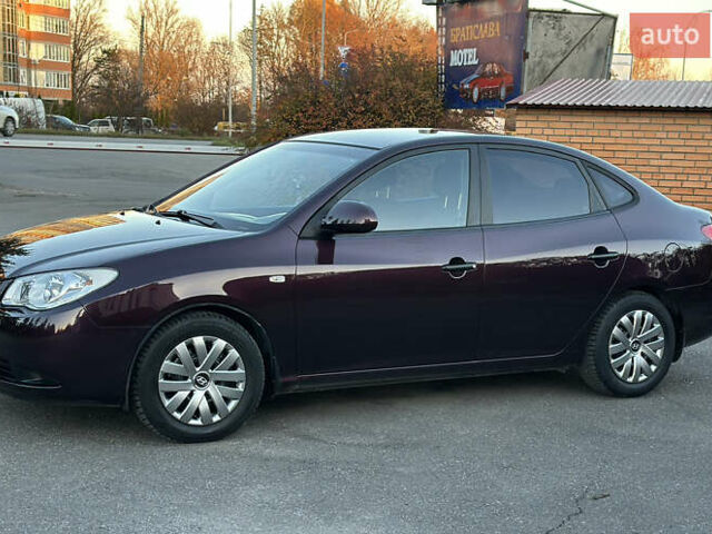 Фиолетовый Хендай Элантра, объемом двигателя 1.6 л и пробегом 198 тыс. км за 6750 $, фото 7 на Automoto.ua