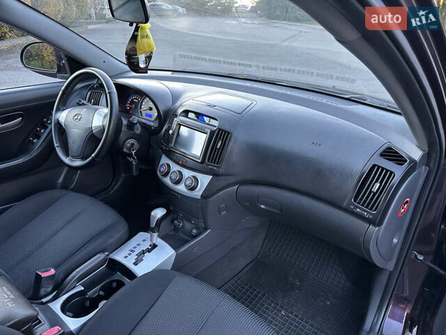 Фіолетовий Хендай Елантра, об'ємом двигуна 1.6 л та пробігом 198 тис. км за 6850 $, фото 24 на Automoto.ua