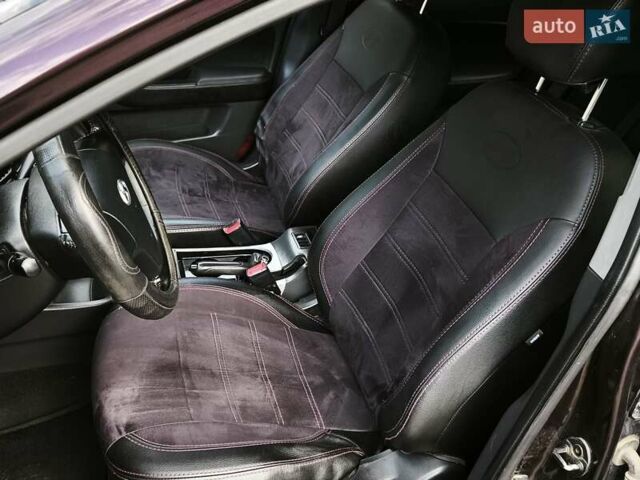 Фиолетовый Хендай Элантра, объемом двигателя 1.59 л и пробегом 276 тыс. км за 4800 $, фото 9 на Automoto.ua