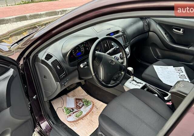 Хендай Элантра 2007 в Тернополе на Automoto.ua Фиолетовый Хендай Элантра, объемом двигателя 1.59 л и пробегом 198 тыс. км за 7299 $, фото 12 на Automoto.ua