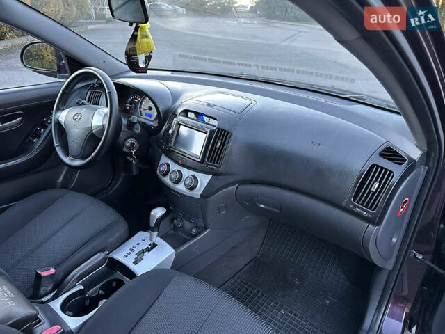 Фиолетовый Хендай Элантра, объемом двигателя 1.6 л и пробегом 198 тыс. км за 6750 $, фото 23 на Automoto.ua