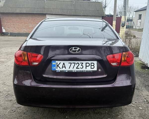 Фиолетовый Хендай Элантра, объемом двигателя 1.98 л и пробегом 322 тыс. км за 6900 $, фото 4 на Automoto.ua