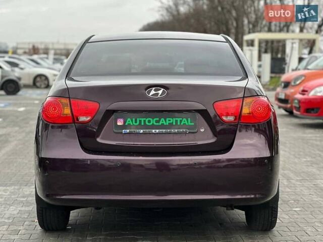 Фиолетовый Хендай Элантра, объемом двигателя 1.98 л и пробегом 322 тыс. км за 7400 $, фото 6 на Automoto.ua