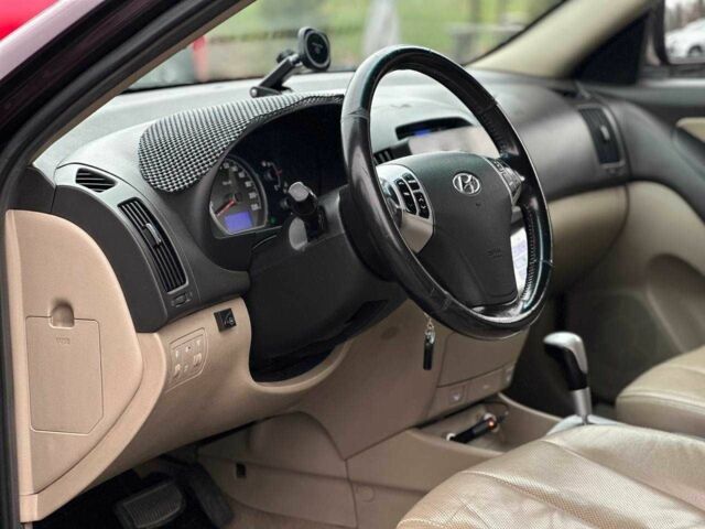 Фиолетовый Хендай Элантра, объемом двигателя 2 л и пробегом 322 тыс. км за 7400 $, фото 8 на Automoto.ua