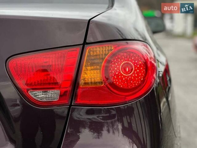 Фиолетовый Хендай Элантра, объемом двигателя 1.98 л и пробегом 322 тыс. км за 7400 $, фото 8 на Automoto.ua