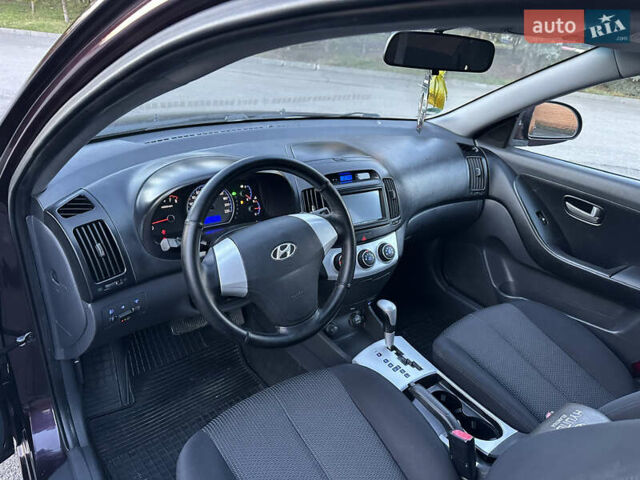 Фиолетовый Хендай Элантра, объемом двигателя 1.6 л и пробегом 198 тыс. км за 6750 $, фото 19 на Automoto.ua