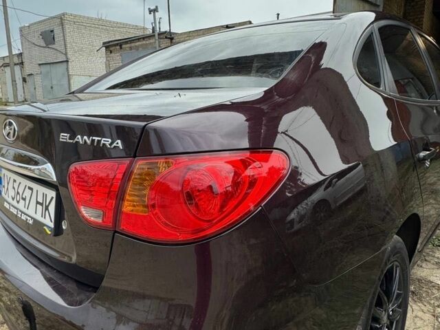 Фиолетовый Хендай Элантра, объемом двигателя 1.6 л и пробегом 216 тыс. км за 6500 $, фото 4 на Automoto.ua