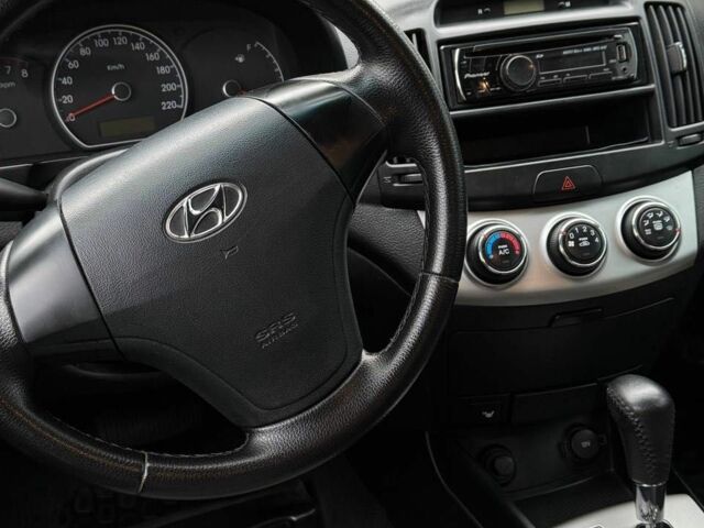 Фиолетовый Хендай Элантра, объемом двигателя 1.6 л и пробегом 216 тыс. км за 6500 $, фото 9 на Automoto.ua