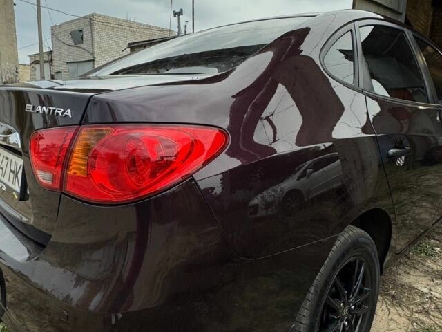 Фиолетовый Хендай Элантра, объемом двигателя 1.6 л и пробегом 216 тыс. км за 6500 $, фото 5 на Automoto.ua
