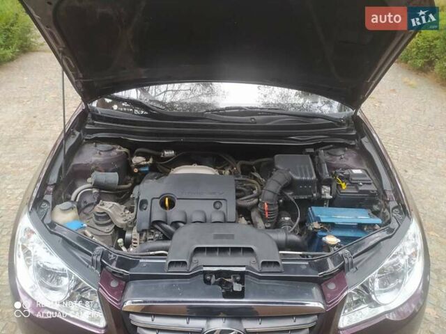 Коричневый Хендай Элантра, объемом двигателя 1.6 л и пробегом 158 тыс. км за 5500 $, фото 12 на Automoto.ua