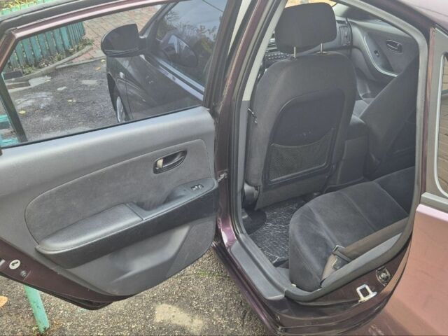 Коричневий Хендай Елантра, об'ємом двигуна 1.6 л та пробігом 210 тис. км за 6700 $, фото 6 на Automoto.ua