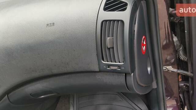 Коричневый Хендай Элантра, объемом двигателя 1.6 л и пробегом 199 тыс. км за 5800 $, фото 6 на Automoto.ua