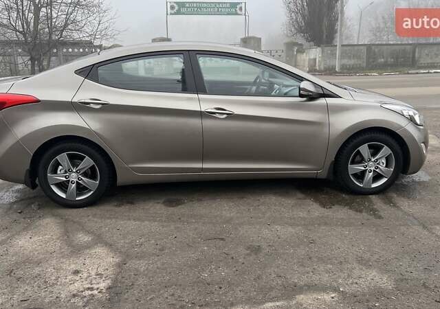 Коричневый Хендай Элантра, объемом двигателя 1.8 л и пробегом 107 тыс. км за 9800 $, фото 4 на Automoto.ua