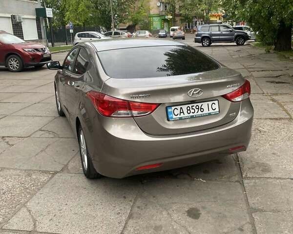 Коричневий Хендай Елантра, об'ємом двигуна 1.8 л та пробігом 95 тис. км за 9699 $, фото 4 на Automoto.ua
