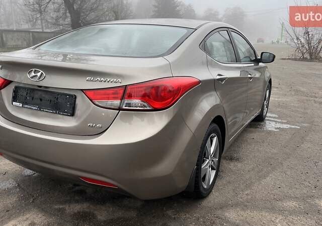 Коричневый Хендай Элантра, объемом двигателя 1.8 л и пробегом 107 тыс. км за 9800 $, фото 6 на Automoto.ua