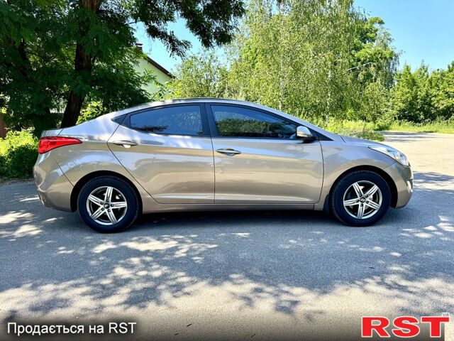 Коричневый Хендай Элантра, объемом двигателя 1.8 л и пробегом 214 тыс. км за 8890 $, фото 6 на Automoto.ua