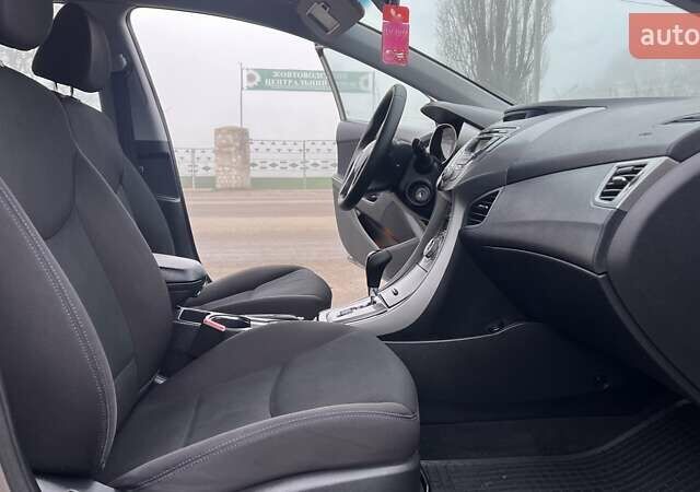 Коричневый Хендай Элантра, объемом двигателя 1.8 л и пробегом 107 тыс. км за 9800 $, фото 27 на Automoto.ua