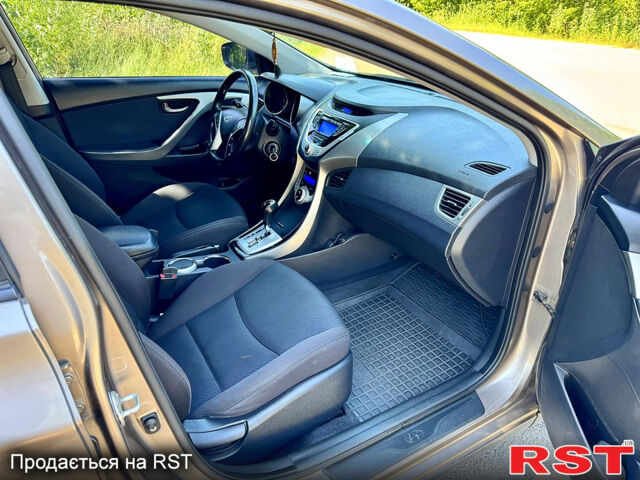 Коричневый Хендай Элантра, объемом двигателя 1.8 л и пробегом 214 тыс. км за 8890 $, фото 12 на Automoto.ua