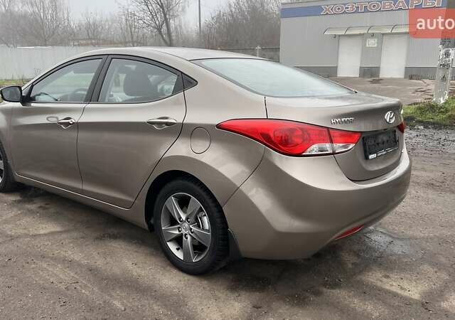 Коричневый Хендай Элантра, объемом двигателя 1.8 л и пробегом 107 тыс. км за 9800 $, фото 8 на Automoto.ua