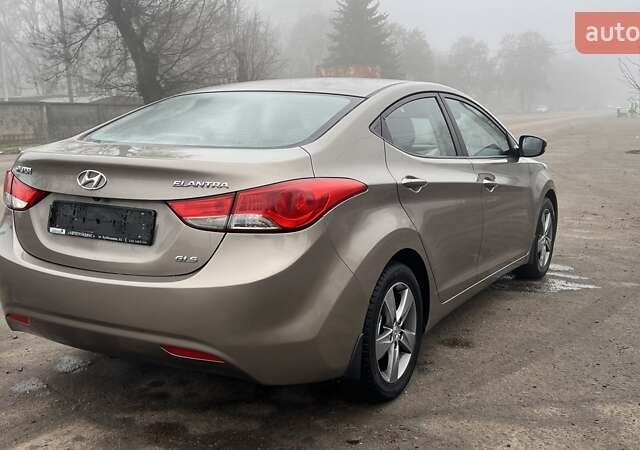 Коричневый Хендай Элантра, объемом двигателя 1.8 л и пробегом 107 тыс. км за 9800 $, фото 19 на Automoto.ua