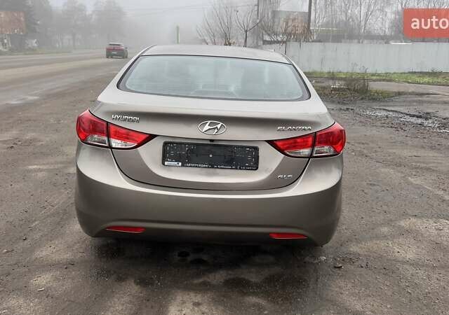 Коричневый Хендай Элантра, объемом двигателя 1.8 л и пробегом 107 тыс. км за 9800 $, фото 9 на Automoto.ua