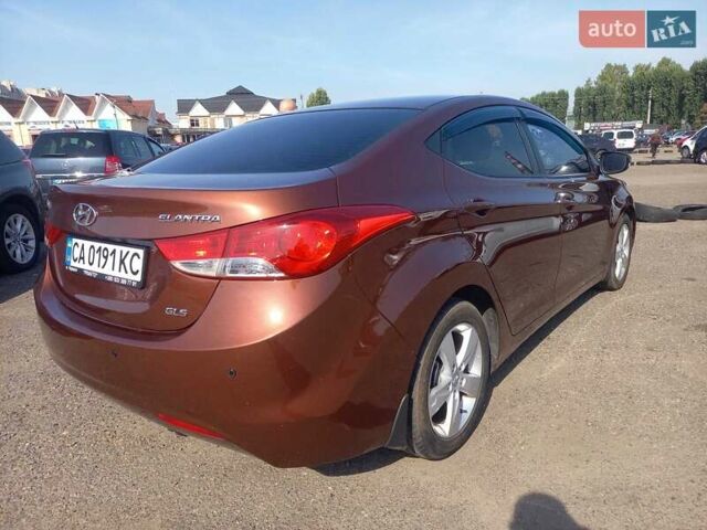 Коричневый Хендай Элантра, объемом двигателя 1.8 л и пробегом 155 тыс. км за 8000 $, фото 6 на Automoto.ua