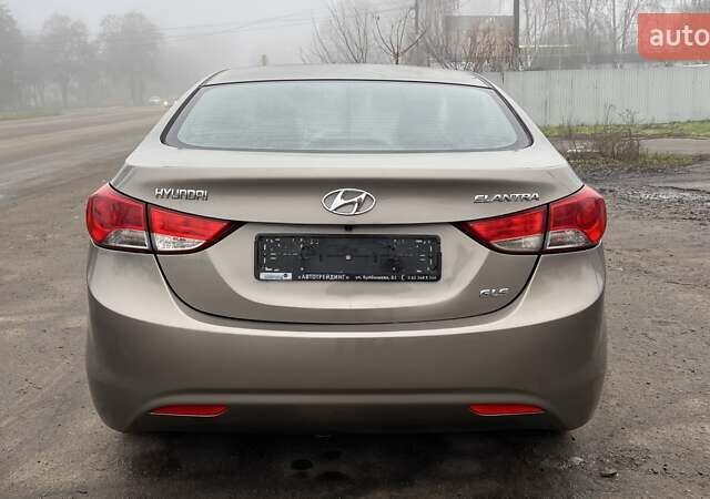 Коричневый Хендай Элантра, объемом двигателя 1.8 л и пробегом 107 тыс. км за 9800 $, фото 22 на Automoto.ua