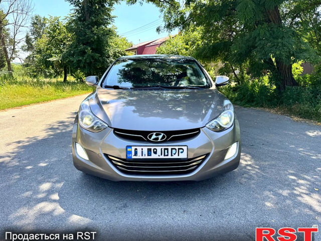 Коричневый Хендай Элантра, объемом двигателя 1.8 л и пробегом 214 тыс. км за 8890 $, фото 1 на Automoto.ua