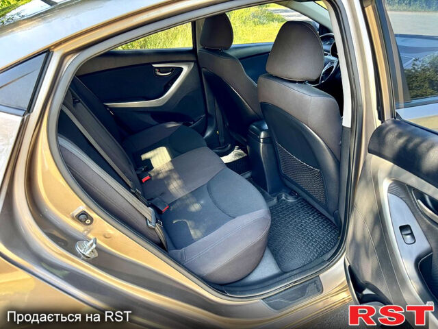 Коричневый Хендай Элантра, объемом двигателя 1.8 л и пробегом 214 тыс. км за 8890 $, фото 11 на Automoto.ua