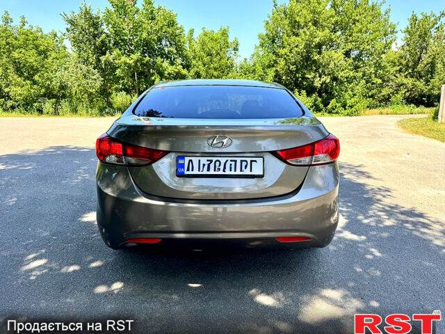 Коричневый Хендай Элантра, объемом двигателя 1.8 л и пробегом 214 тыс. км за 8890 $, фото 4 на Automoto.ua