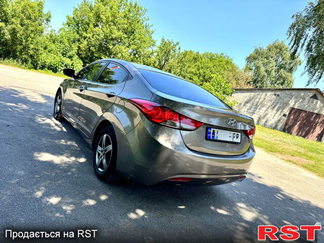 Коричневый Хендай Элантра, объемом двигателя 1.8 л и пробегом 214 тыс. км за 8890 $, фото 3 на Automoto.ua