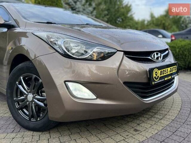 Коричневый Хендай Элантра, объемом двигателя 1.59 л и пробегом 140 тыс. км за 9700 $, фото 9 на Automoto.ua
