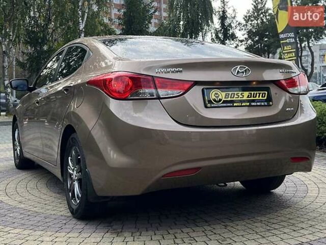 Коричневый Хендай Элантра, объемом двигателя 1.59 л и пробегом 140 тыс. км за 9700 $, фото 4 на Automoto.ua