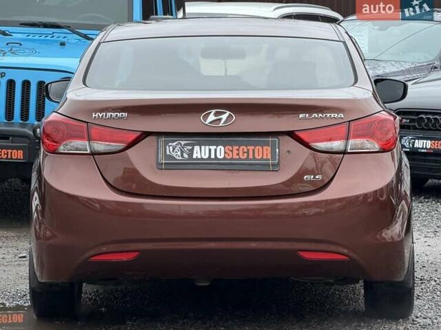 Коричневый Хендай Элантра, объемом двигателя 1.59 л и пробегом 247 тыс. км за 8900 $, фото 6 на Automoto.ua