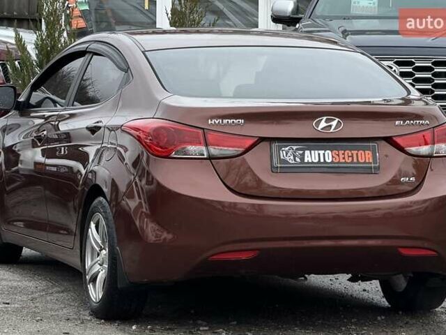 Коричневый Хендай Элантра, объемом двигателя 1.59 л и пробегом 247 тыс. км за 8900 $, фото 2 на Automoto.ua