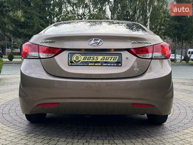 Коричневый Хендай Элантра, объемом двигателя 1.59 л и пробегом 140 тыс. км за 9700 $, фото 5 на Automoto.ua