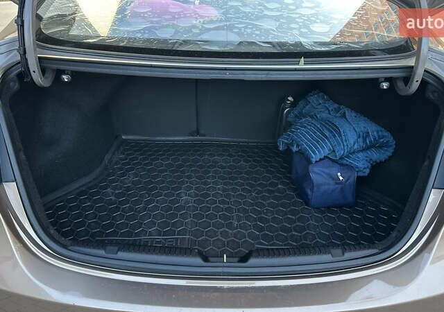 Хендай Элантра 2014 в Львове на Automoto.ua Коричневый Хендай Элантра, объемом двигателя 1.59 л и пробегом 104 тыс. км за 9000 $, фото 21 на Automoto.ua