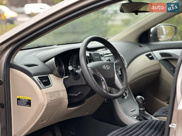Коричневый Хендай Элантра, объемом двигателя 1.8 л и пробегом 128 тыс. км за 9500 $, фото 24 на Automoto.ua