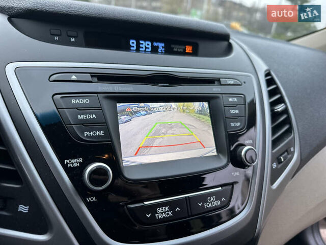 Коричневый Хендай Элантра, объемом двигателя 1.8 л и пробегом 128 тыс. км за 9500 $, фото 39 на Automoto.ua