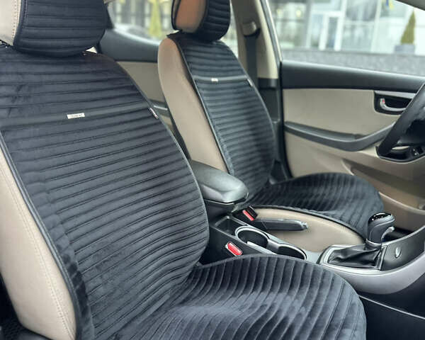 Коричневый Хендай Элантра, объемом двигателя 1.8 л и пробегом 128 тыс. км за 9500 $, фото 36 на Automoto.ua