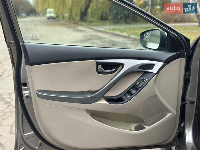 Коричневый Хендай Элантра, объемом двигателя 1.8 л и пробегом 128 тыс. км за 9500 $, фото 23 на Automoto.ua