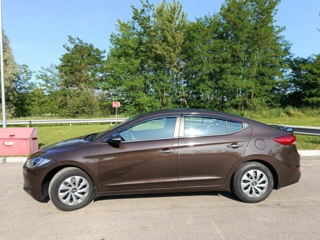 Коричневый Хендай Элантра, объемом двигателя 1.6 л и пробегом 86 тыс. км за 12300 $, фото 1 на Automoto.ua