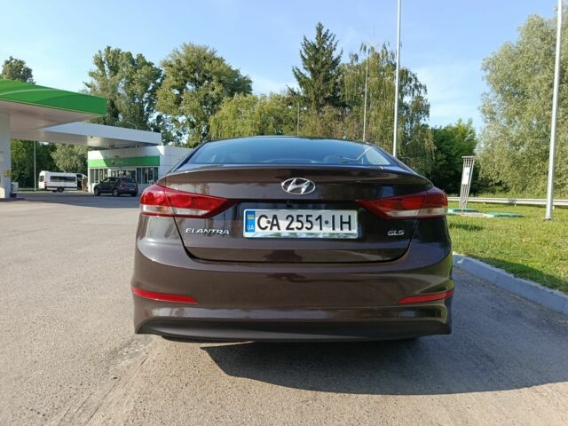 Коричневый Хендай Элантра, объемом двигателя 1.6 л и пробегом 86 тыс. км за 12300 $, фото 12 на Automoto.ua