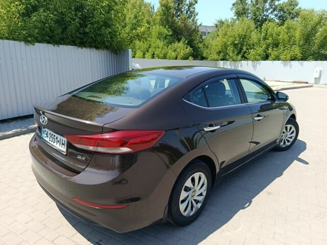 Коричневый Хендай Элантра, объемом двигателя 1.6 л и пробегом 86 тыс. км за 12300 $, фото 5 на Automoto.ua