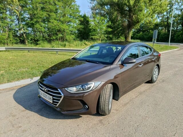 Коричневый Хендай Элантра, объемом двигателя 1.6 л и пробегом 86 тыс. км за 12300 $, фото 2 на Automoto.ua